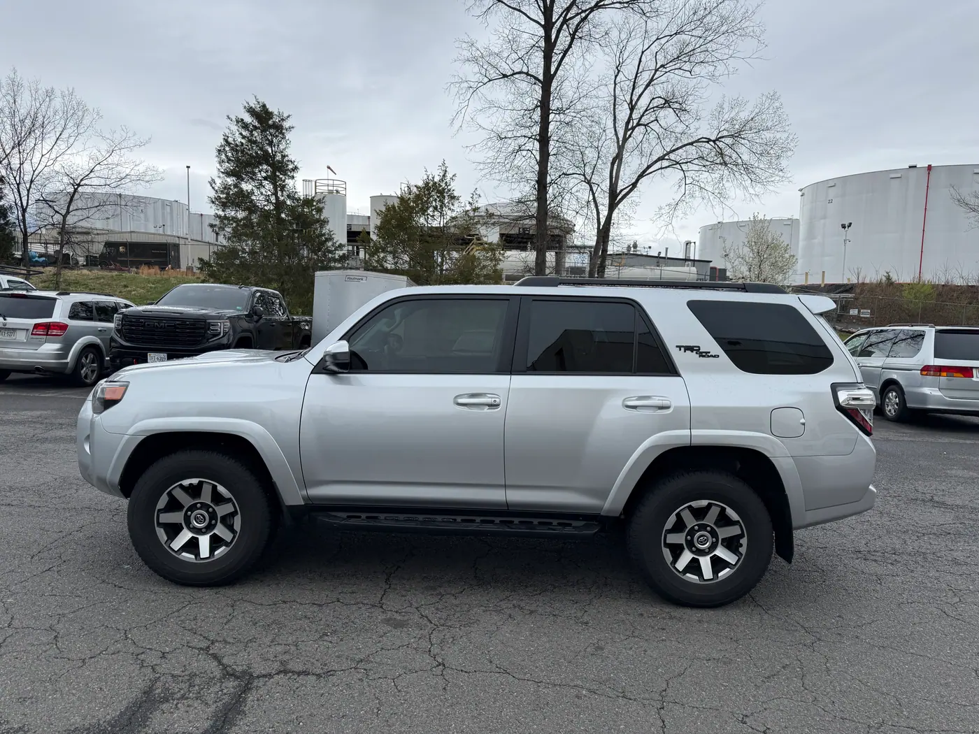 Silver SUV with tinted windows, photographed side-on.